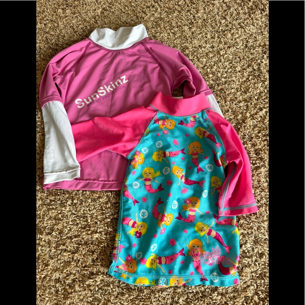 Two UV protected swim shirts, size 2/2T